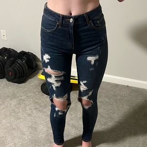 Ripped blue skinny jeans